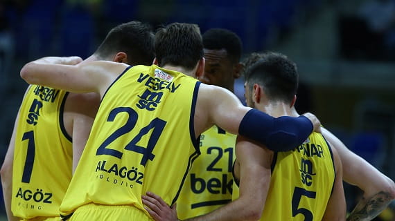 Fenerbahce basketball team at group hug